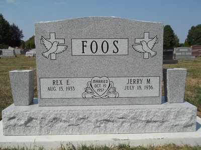 Double upright headstone in gray granite