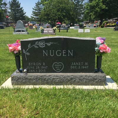 Double upright memorial headstone in black granite