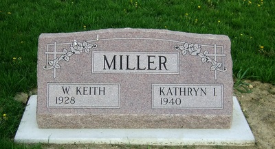 Double 3ft. slant style headstone in morning rose pink granite