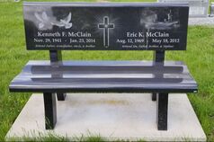 memorial bench with laser etchings in black granite