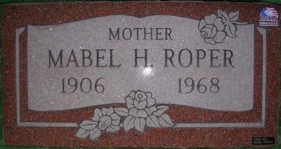 Single flat headstone in red granite